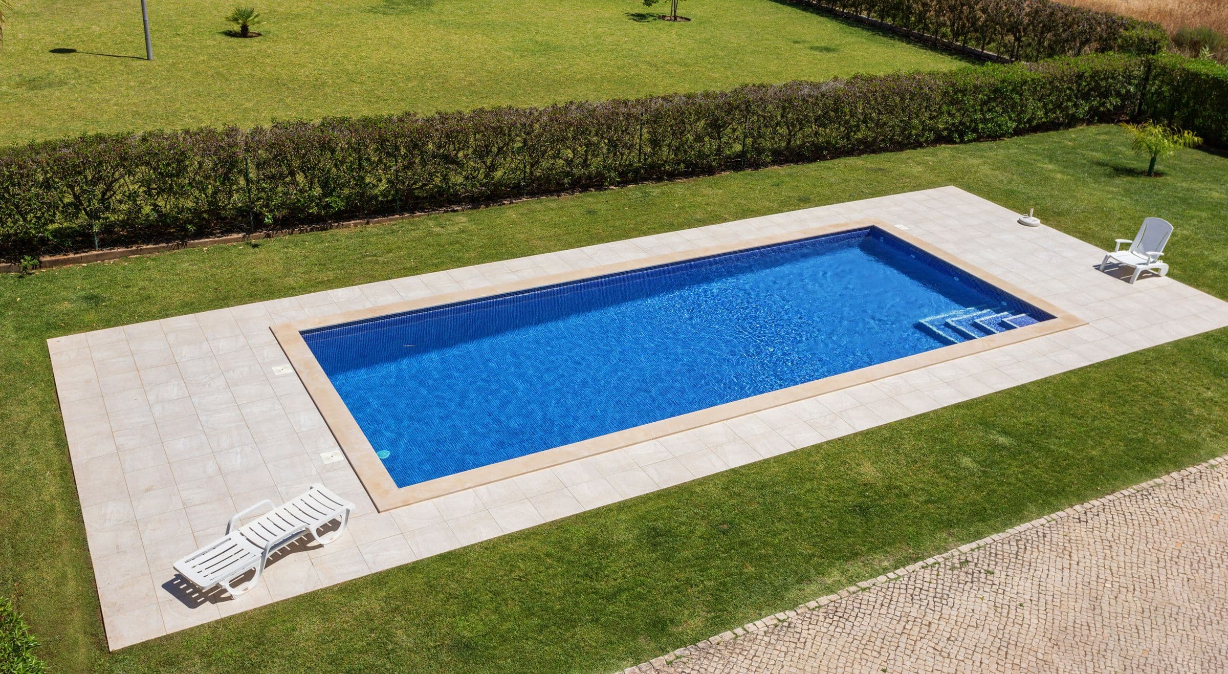 A hotel pool in the sun