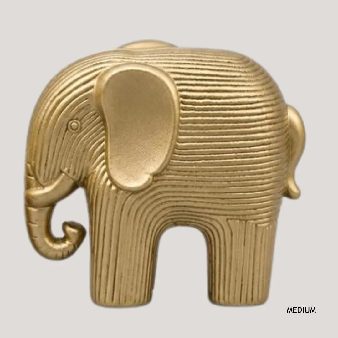 Gold resin elephant, 18 cm