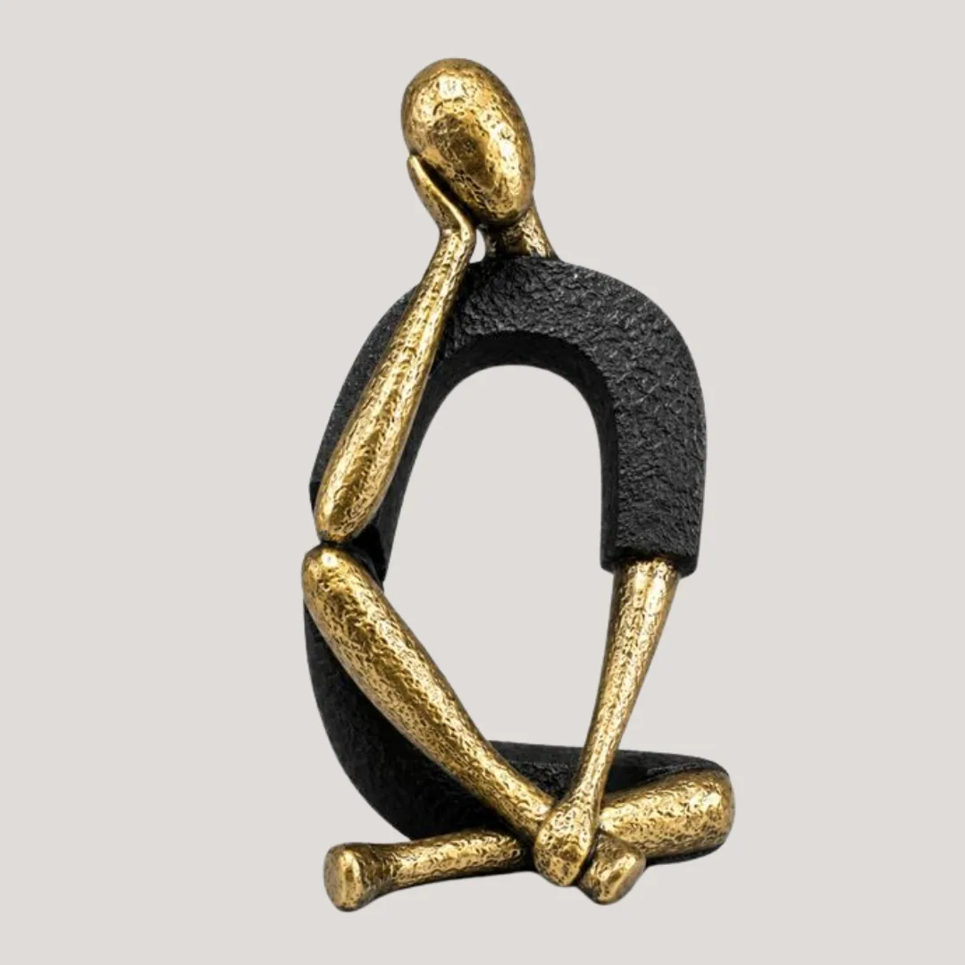 Black and gold resin figure, one hand, 10 x 14 x 19 cm