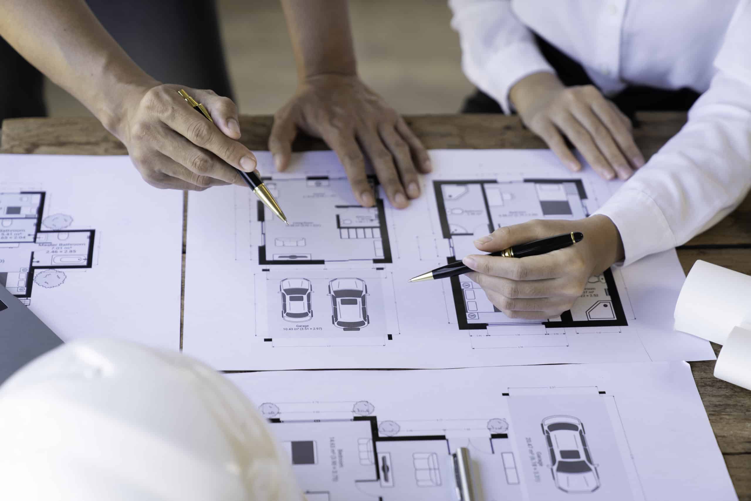 architecture-engineer-teamwork-meeting-drawing-an-2026-01-09-06-34-20-utc